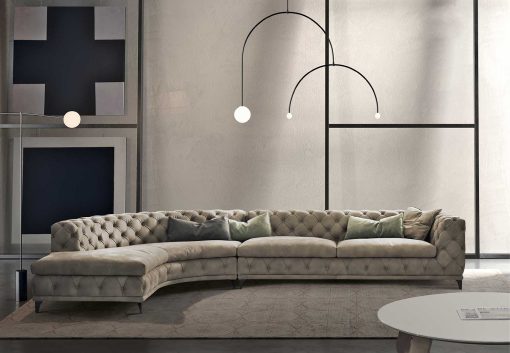 Luxurious Chesterfield sofa reinterpreted in a modern way. Made in Italy high-quality home furniture for the more demanding people. Free home shipping.