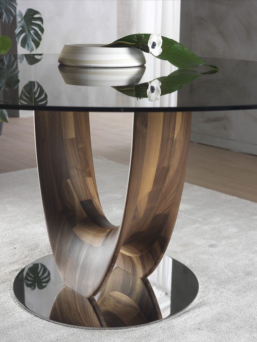 Round table designed by Stefano Bigi. Glass top. Walnut wood base. Available for online shopping. Free delivery.