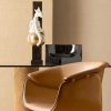 Elegant and luxurious leather stool. Revolving structure, height-adjustable. Design Noé Duchaufour Lawrence. Made in Italy. Worldwide home delivery.