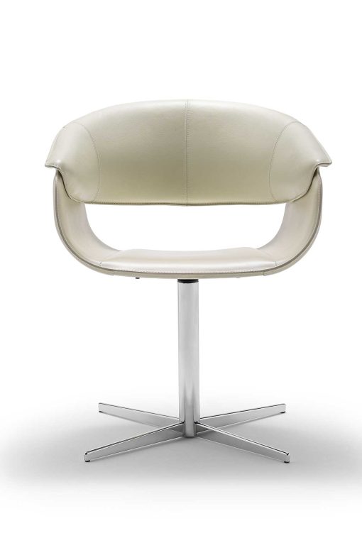 Luxurious swivel leather armchair designed by Noé Duchaufour Lawrance. Ivory colour and shiny chrome cross-shaped base (customizable). Worldwide delivery.