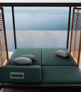 Alcova is an intimate and exclusive outdoor daybed that looks like a large luxurious canopy bed with 2 independent reclining mattresses. Free home delivery.