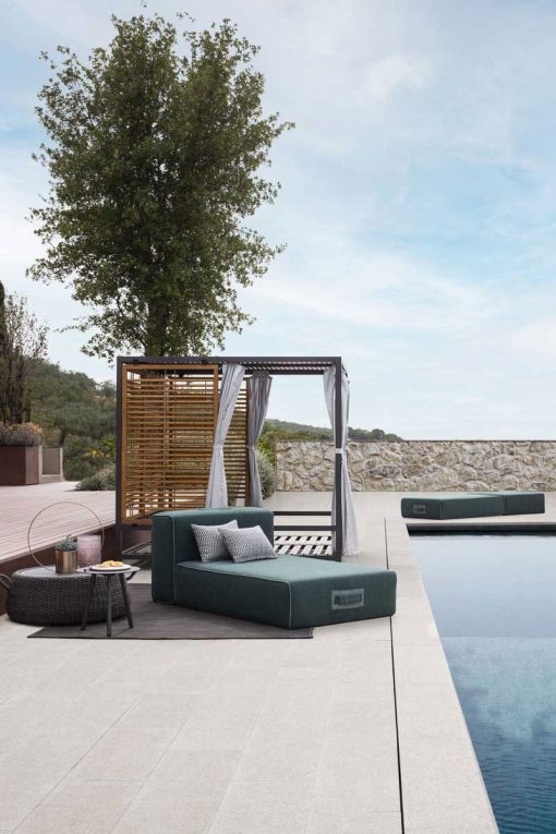 Alcova is an intimate and exclusive outdoor daybed that looks like a large luxurious canopy bed with 2 independent reclining mattresses. Free home delivery.