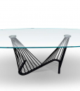 Harp shaped, this oval fixed table has a metal base and extra clear glass top. Perfect in a refined living room or in a prestigious office. Free delivery.