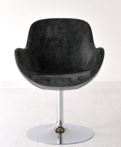 Shell shaped swivel armchair covered with refined velvet and leather. Its chrome bombed round base will complete this luxurious item for home / contract use