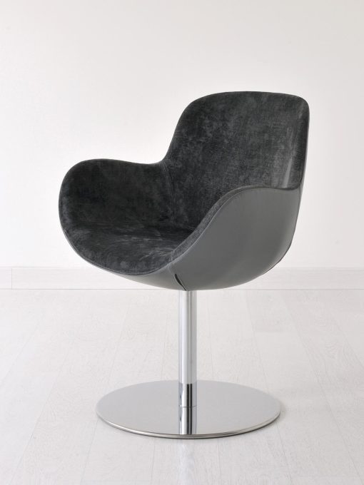 Swivel armchair with flat disk base. Chrome round metal base, velvet and leather covering. Design by Edi & Paolo Ciani. Luxurious furniture. Free shipment.