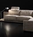 Comfort and elegance come together in this modular luxury leather corner sofa with clean and rational lines, where the low shelves enhance its functionality.