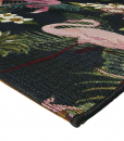 Pink flamingos, flowers and leaves on a black background. A rectangular outdoor rug for the most refined gardens, terraces or poolside spaces. Free delivery