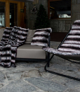 Stainless steel frame, gloss black finish. The deckchair in eco-leather (chinchilla or grey fox) is suitable for outdoor use in the most luxurious chalets. gray fox, camel, alpaca, tabuk, chinchilla.