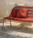 A wonderful red outdoor love seat sofa designed by Ludovica + Roberto Palomba. Aluminium frame and intertwined synthetic ropes. Free home delivery.
