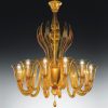 Doge est une magnifique suspension en verre de Murano qui vous offrira un éclairage de qualité tout en apportant une touche décorative de luxe à votre pièce.