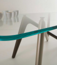 Unusual legs intersection in bronze and titanium colour and extra clear safety glass cm. 110 x 220 or 120 x 240. Edge luxurious original rectangular table.