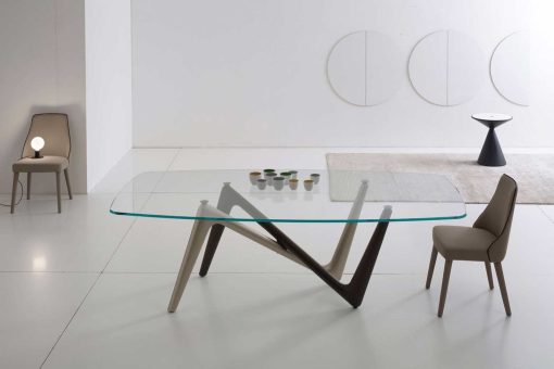 Unusual legs intersection in bronze and titanium colour and extra clear safety glass cm. 110 x 220 or 120 x 240. Edge luxurious original rectangular table.