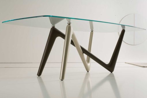 Unusual legs intersection in bronze and titanium colour and extra clear safety glass cm. 110 x 220 or 120 x 240. Edge luxurious original rectangular table.