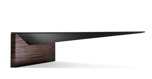 Luxurious and very original executive desk in ebony wood and leather covering. Ferruccio Laviani design, made in Italy. Worldwide delivery office furniture.