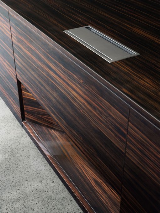 Luxurious and very original executive desk in ebony wood and leather covering. Ferruccio Laviani design, made in Italy. Worldwide delivery office furniture.