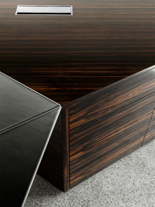 Luxurious and very original executive desk in ebony wood and leather covering. Ferruccio Laviani design, made in Italy. Worldwide delivery office furniture.