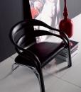 Poltrona lounge di Vladimir Kagan. Struttura in acciaio e rivestimento in cuoio pieno fiore. Colore e finiture personalizzabili. Consegna gratuita.