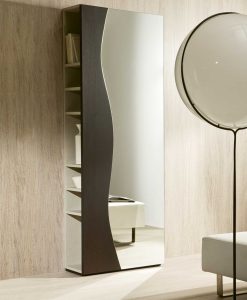 FUTUR is an entrance unit in wengé with a coat rack as well as a mirror with side compartments designed by Studio CONTRODESIGN.