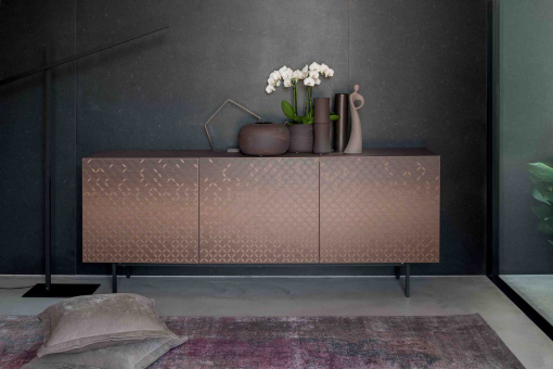 Giove lacquered sideboard with 3D decoration in bronze metallic finish.