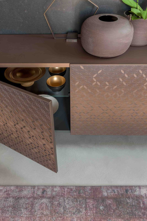 Giove lacquered sideboard with 3D decoration in bronze metallic finish.