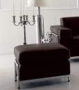 Java is a luxury leather ottoman that features a gently tufted lift-top seat and clean-lined silhouette; elements that accents elegant and modern aesthetics.