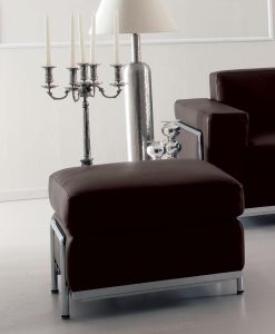 Java is a luxury leather ottoman that features a gently tufted lift-top seat and clean-lined silhouette; elements that accents elegant and modern aesthetics.