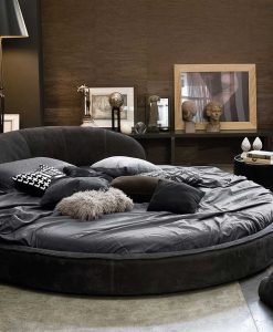 An extraordinary round bed to furnish the most elegant bedrooms. Leather covered. Wood frame. Many colours available. Online shopping, free delivery.