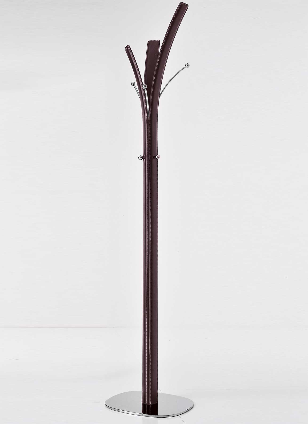 Refined clothes stand designed by Arter and Citton. Covered with regenerated leather. Metal frame, chromed details. Home delivery, online shopping.