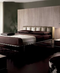 Luxurious and elegant leather bed. Design by Mauro Lipparini. Leather covering, steel and wood frame. Online shopping. Free home delivery.