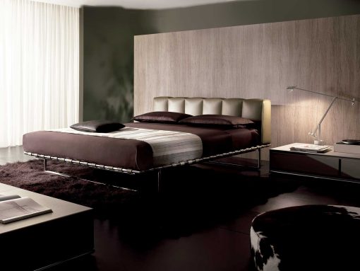 Luxurious and elegant leather bed. Design by Mauro Lipparini. Leather covering, steel and wood frame. Online shopping. Free home delivery.