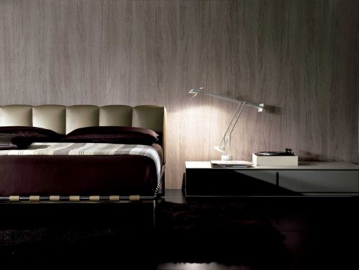 Luxurious and elegant leather bed. Design by Mauro Lipparini. Leather covering, steel and wood frame. Online shopping. Free home delivery.