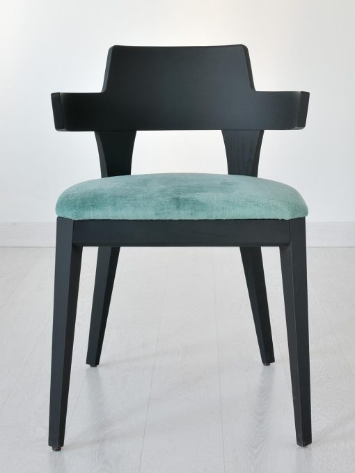 Padded chair in wood with armrests. Covering in velvet or in soft leather. Many colours available. Online shopping and home delivery. Made in Italy.