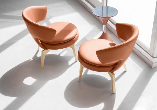 Lolita small armchair in orange leather has an ash base and can be shipped for free. Ideal for use at home or in a luxurious office. Online shopping