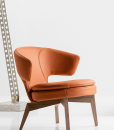 Lolita armchair in orange leather and walnut base