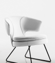 Lolita small armchair in white leather has a metal sledge base and can be shipped for free. Ideal for use at home or in a luxurious office. Online shopping