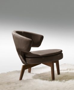 Lolita small armchair in brown leather has a walnut base and can be shipped for free. Ideal for use at home or in a luxurious office. Online shopping