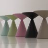 Andrea Lucatello's Lucy round coffee table made with recyclable polyethylene. Removable bicoloured top, internal compartment. Made in Italy. Home delivery.
