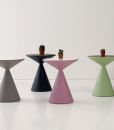 Andrea Lucatello's Lucy round coffee table made with recyclable polyethylene. Removable bicoloured top, internal compartment. Made in Italy. Home delivery.
