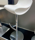 Meggy is an adjustable bar stool with a modern and original style. Outfit the home bar with this chrome frame bar stool, perfect in the parlor or in any other living space.