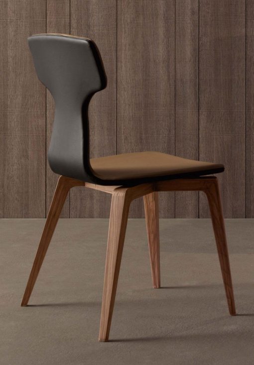 Monica est une chaise bicolore en bois et éco cuir très originale. Découvrez notre collection de chaises de salle à manger ou bureau au design italien.