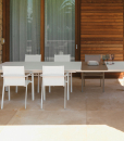 Margot is an aluminum patio dining table designed by Marco Acerbis. Enhance your outdoor furnishings with this modern and elegant aluminum outdoor dining table.