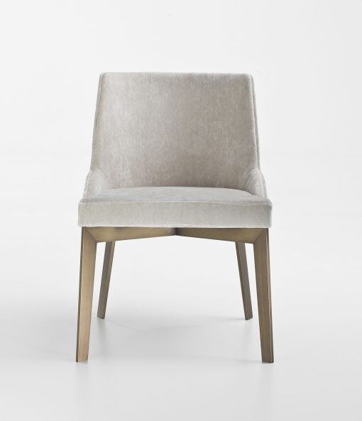 Umberto Asnago designs the MIA collection, home furniture for the traditional dining room. The upholstered chair is covered in velvety fabric. Free delivery