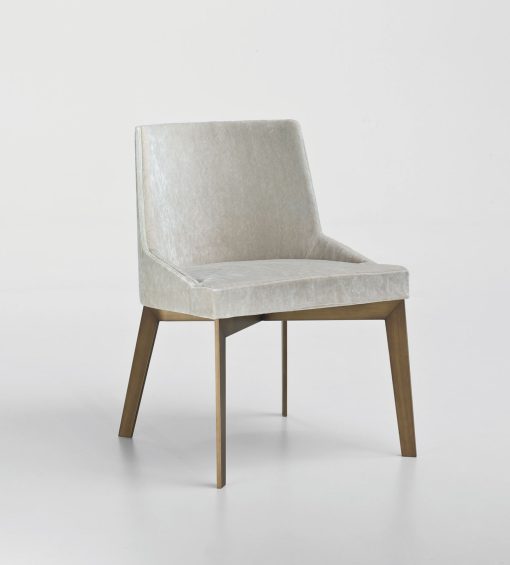 Umberto Asnago designs the MIA collection, home furniture for the traditional dining room. The upholstered chair is covered in velvety fabric. Free delivery