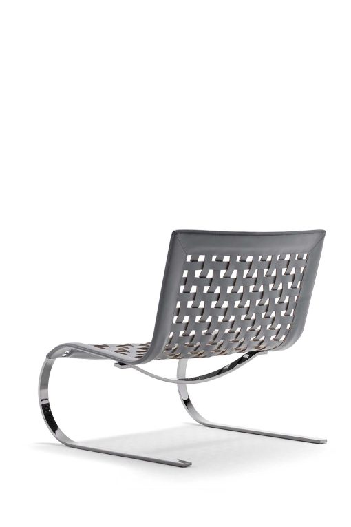 Design Giancarlo Vegni. Lounge armchair in galvanized steel and grey leather. Sled base. Made in Italy and customizable. Free home delivery.