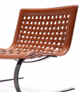 Ampia seduta in cuoio. Base a slitta. Design Giancarlo Vegni. Realizzata interamente in Italia, in Toscana. Poltrona lounge comoda e lussuosa.