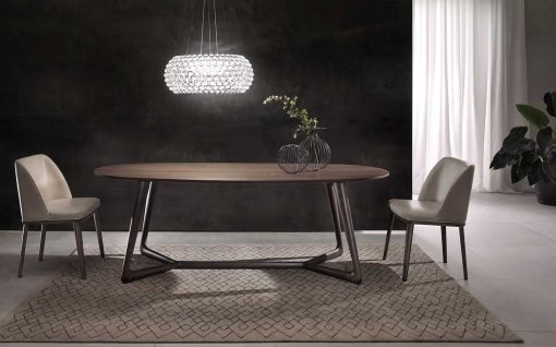 Table de repas ovale en frêne laqué noir. Vente en ligne de tables et meubles design hauts de gamme made in italy avec livraison gratuite.