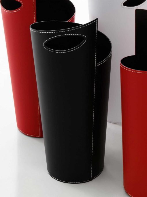 Black iron umbrella stand covered with regenerated leather. Furniture accessory in white, black or red colour. Online shopping and home delivery.