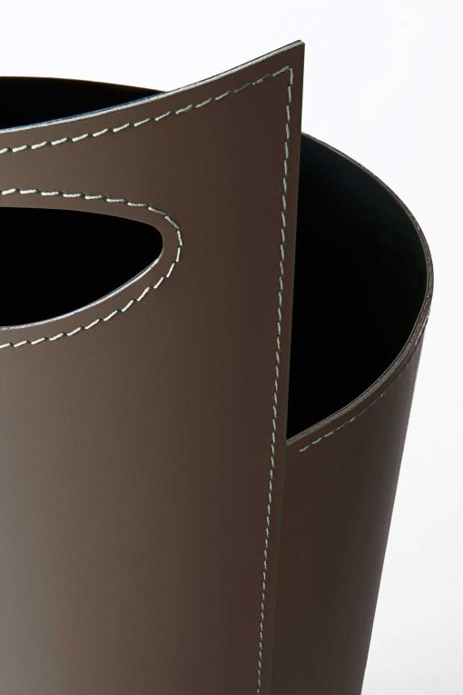 Black iron umbrella stand covered with regenerated leather. Furniture accessory in white, black or red colour. Online shopping and home delivery.
