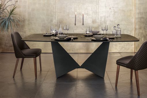 Majestic ceramic dining table, sculptural and elegant. Made in Italy with the best know-how and materials. Design by Riccardo Buscato. Free home delivery.