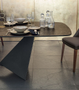 Majestic ceramic dining table, sculptural and elegant. Made in Italy with the best know-how and materials. Design by Riccardo Buscato. Free home delivery.
